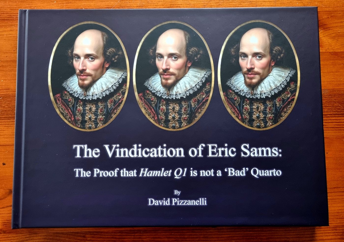 The proof copy of the book: a dark indigo cover with three oval portraits of the young Shakespeare above the title ‘The Vindication of Eric Sams: The Proof that Hamlet Q1 is not a ‘Bad’ Quarto’, by David Pizzanelli.